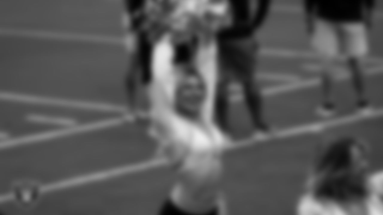 Raiderette Isabella on the sidelines during a 2025 Training Camp mock game at Allegiant Stadium.