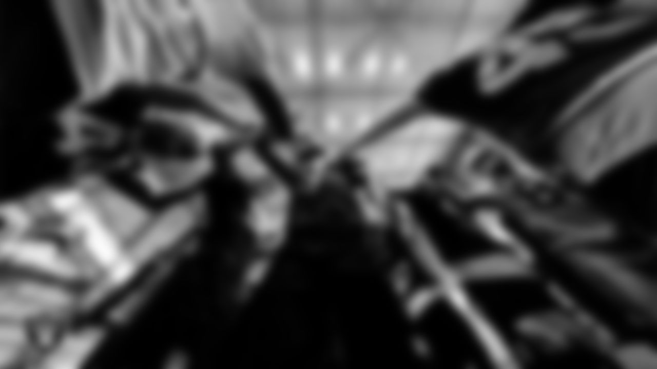 The Las Vegas Raiders huddle during practice at Intermountain Health Performance Center.