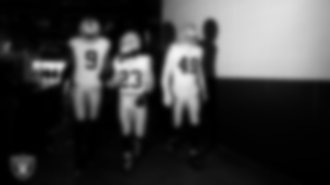 Las Vegas Raiders defensive end Tyree Wilson (9), running back Dylan Laube (23) and defensive end Charles Snowden (49) walk down the tunnel before the regular season away game against the Philadelphia Eagles at Lincoln Financial Field.