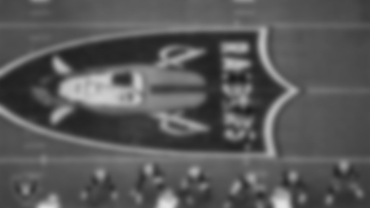 The Las Vegas Raiders offense lines up before the snap during the preseason home game against the San Francisco 49ers at Allegiant Stadium.