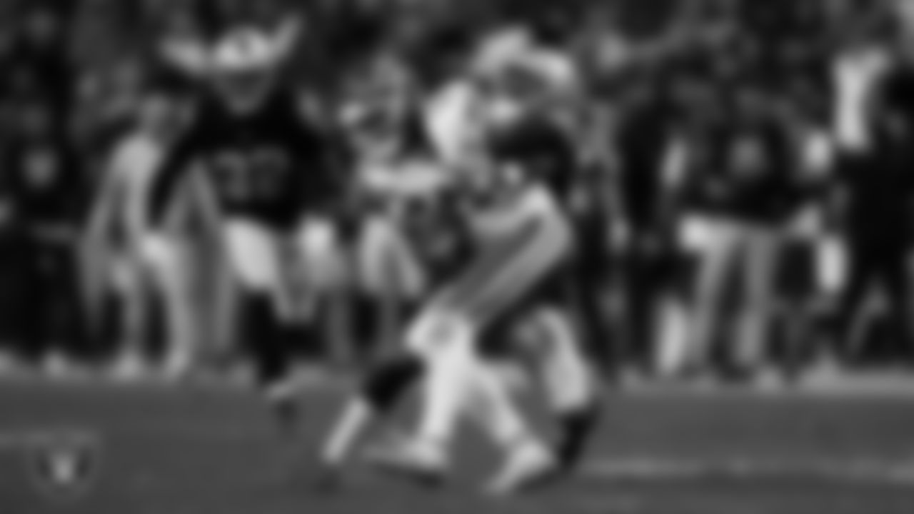Las Vegas Raiders cornerback Darnay Holmes (30) makes a tackle during the regular season home game against the Kansas City Chiefs at Allegiant Stadium.