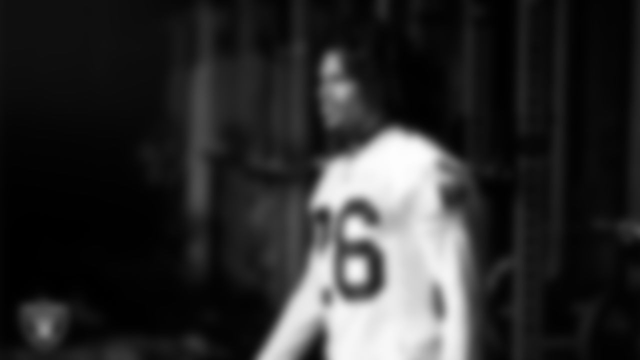 Las Vegas Raiders cornerback Darien Porter (26) walks out to the field for practice at Intermountain Health Performance Center.