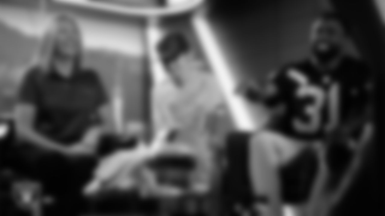 Las Vegas Raiders running back Raheem Mostert (31) works with representatives from Candlelighters Childhood Cancer Foundation and designers to design cleats for My Cause My Cleats in Cox Studios at Intermountain Health Performance Center.