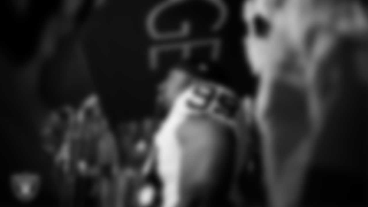 Las Vegas Raiders defensive tackle Thomas Booker IV (99) waits for the team to be introduced onto the field before the regular season away game against the Indianapolis Colts at Lucas Oil Stadium.