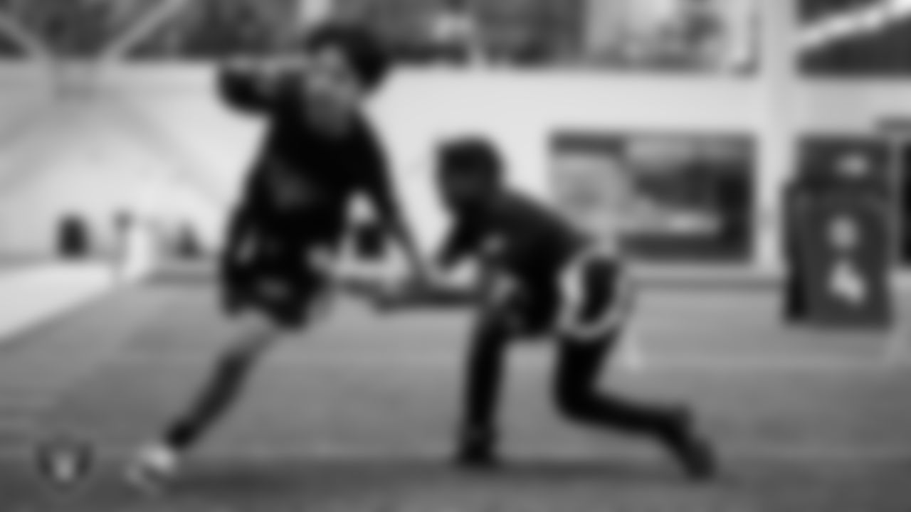 Students go through a drill during a Raiders Junior Training Camp at Intermountain Health Performance Center.