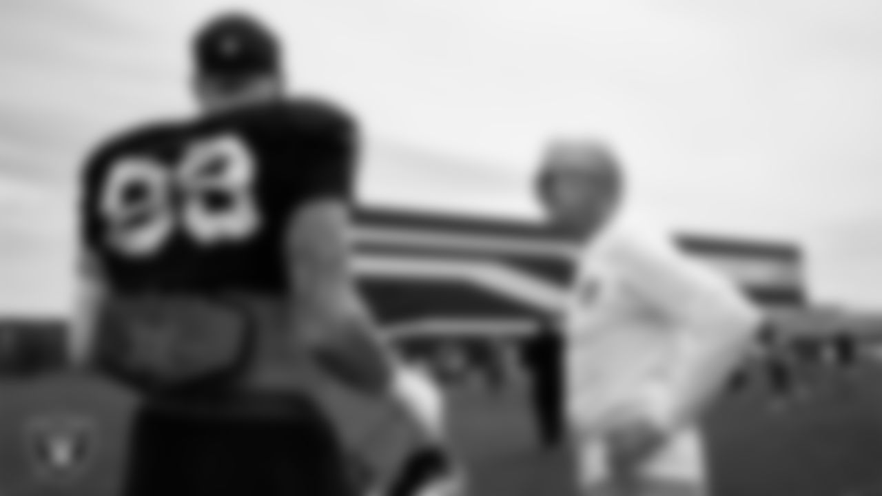 Las Vegas Raiders defensive end Maxx Crosby (98) and Head Coach Pete Carroll during practice at Intermountain Health Performance Center.