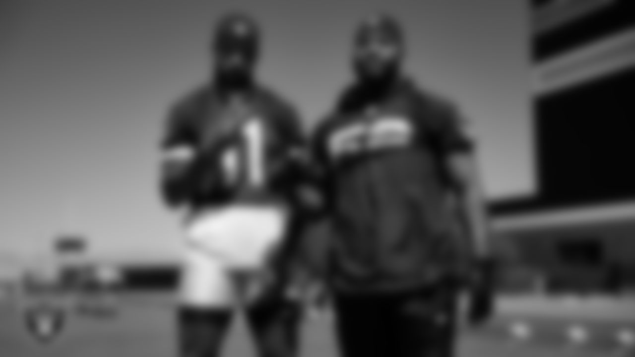 Las Vegas Raiders safety Jeremy Chinn (11) and linebacker Elandon Roberts (52) on the field for mandatory minicamp at Intermountain Health Performance Center.