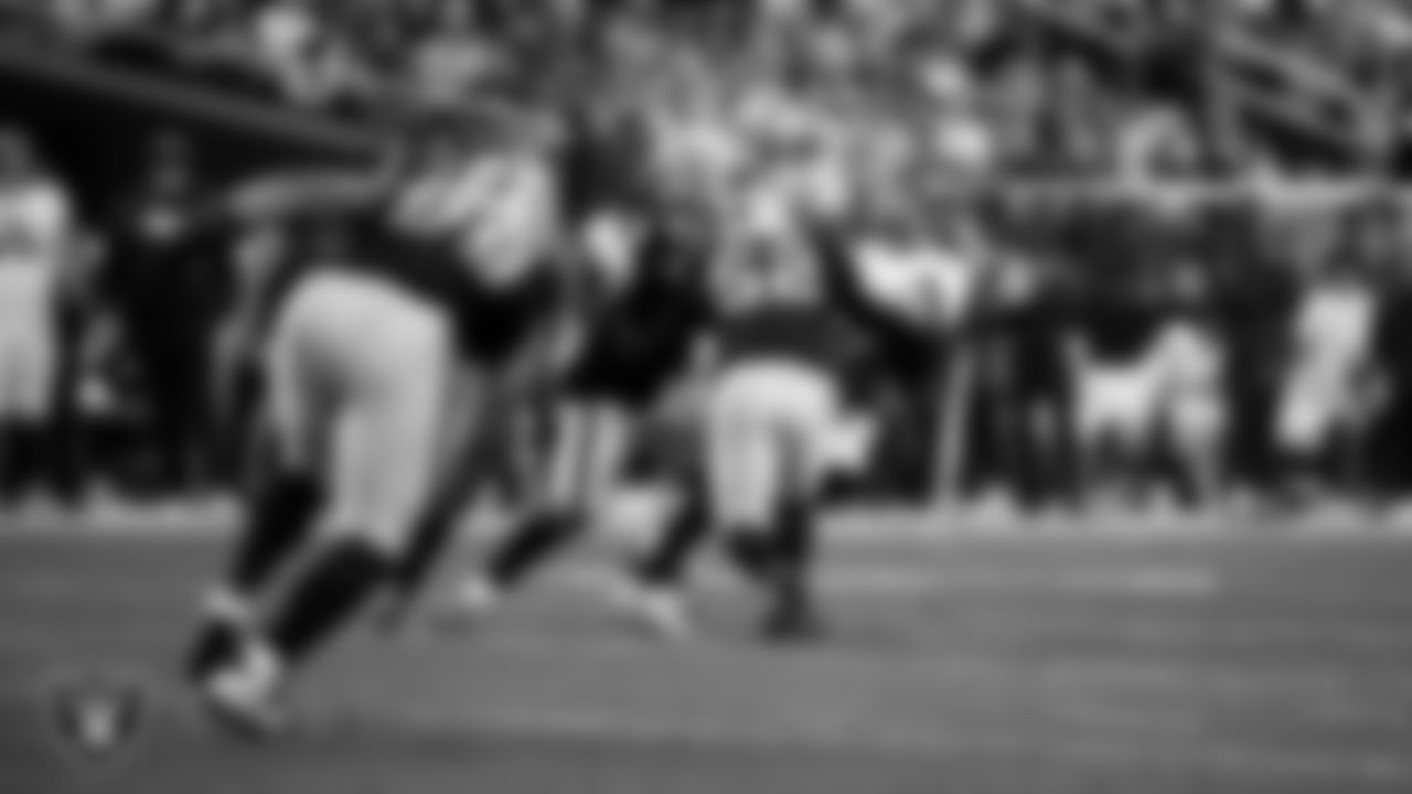 Las Vegas Raiders linebacker Devin White (45) and linebacker Elandon Roberts (52) during the regular season home game against the Denver Broncos at Allegiant Stadium.