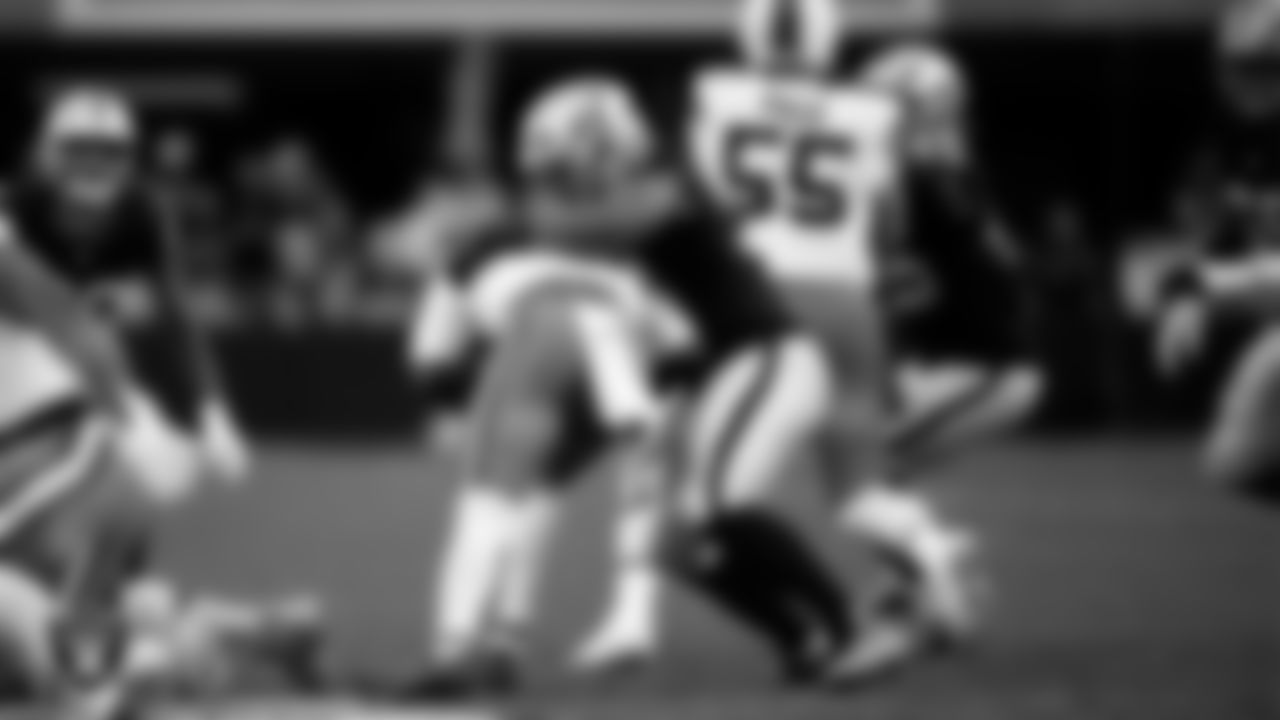 Las Vegas Raiders defensive tackle Thomas Booker IV (99) makes a tackle during the regular season home game against the Cleveland Browns at Allegiant Stadium.