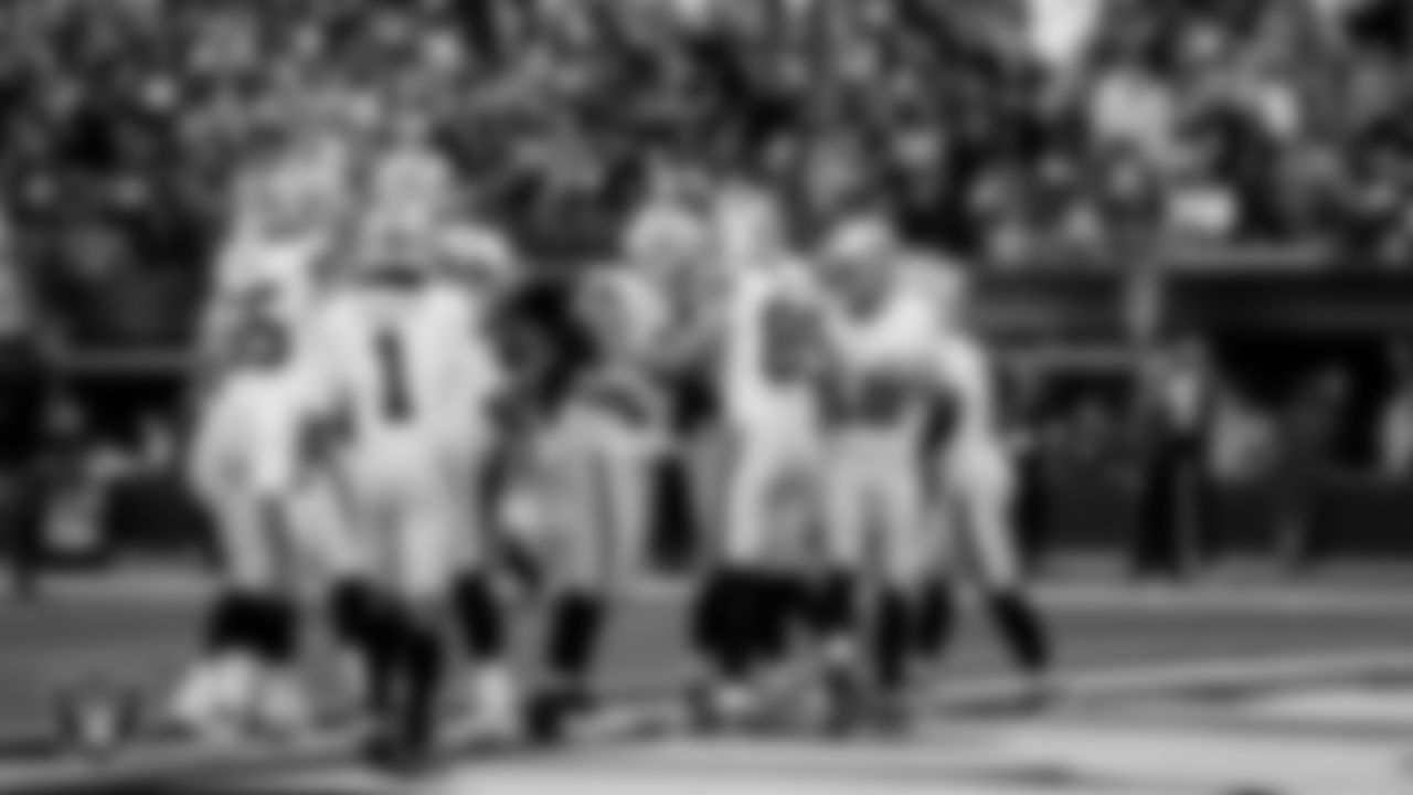 Las Vegas Raiders tight end Brock Bowers (89) celebrates with teammates after making a 6-yard touchdown catch during the regular season away game against the Los Angeles Chargers at SoFi Stadium.