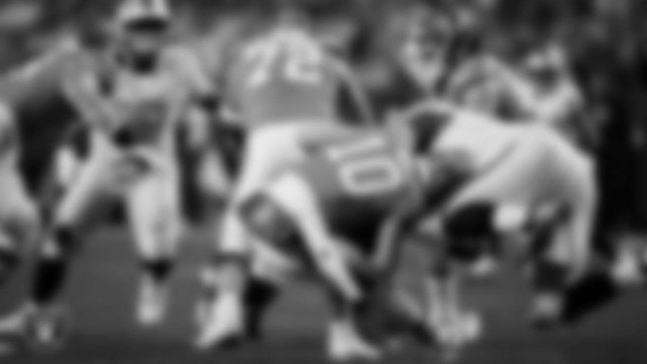 Las Vegas Raiders defensive tackle Adam Butler (69) sacks the quarterback during the regular season away game against the Denver Broncos at Empower Field at Mile High.