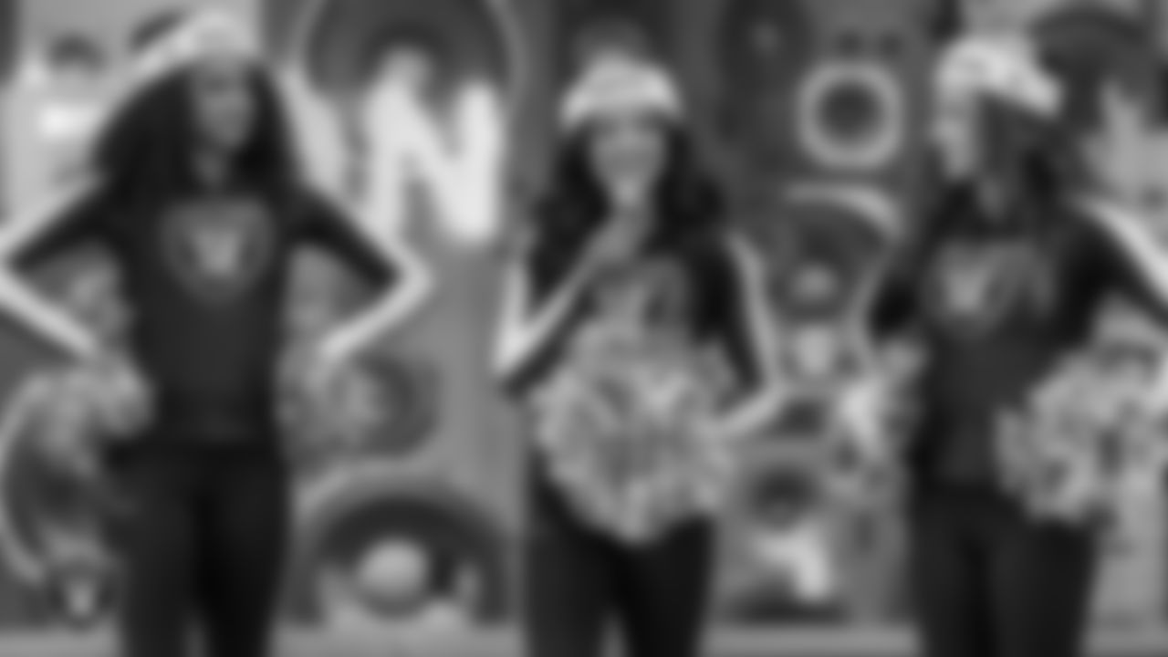 Raiderette Sloane speaks during a toy drive at Intermountain Health Primary Children's Hospital.