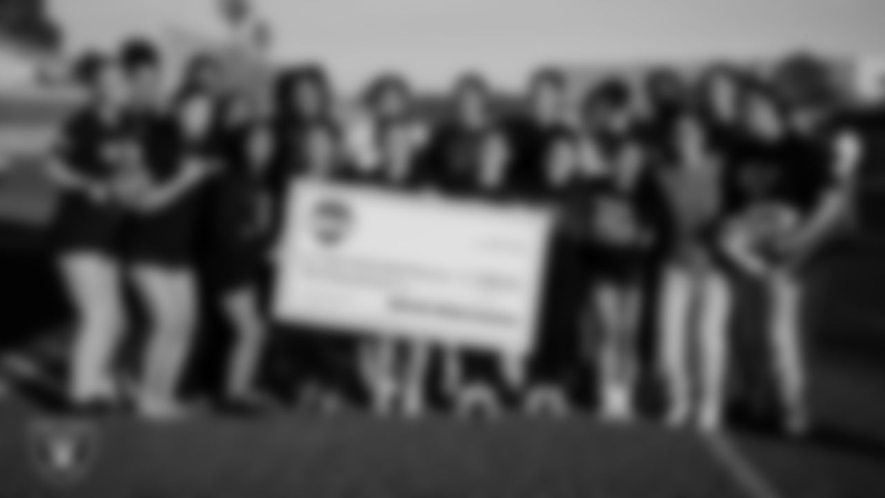 The Green Valley High School flag football team poses for a photo during practice at Green Valley High School.