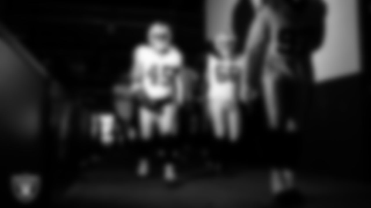 Las Vegas Raiders linebacker Devin White (45) and guard Dylan Parham (66) walk down the tunnel before the regular season away game against the Philadelphia Eagles at Lincoln Financial Field.