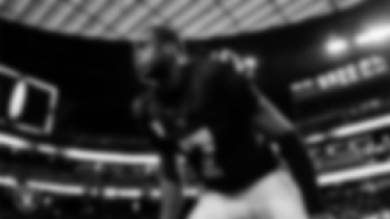 Las Vegas Raiders quarterback Geno Smith (7) warming up before the regular season home game against the Los Angeles Chargers at Allegiant Stadium.