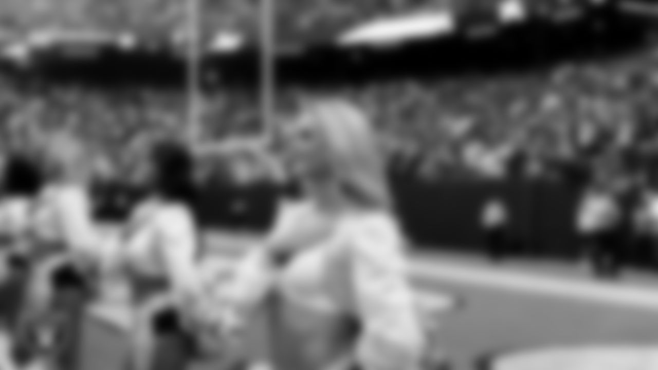 Raiderette Jessica during the national anthem before the preseason home game against the San Francisco 49ers at Allegiant Stadium.