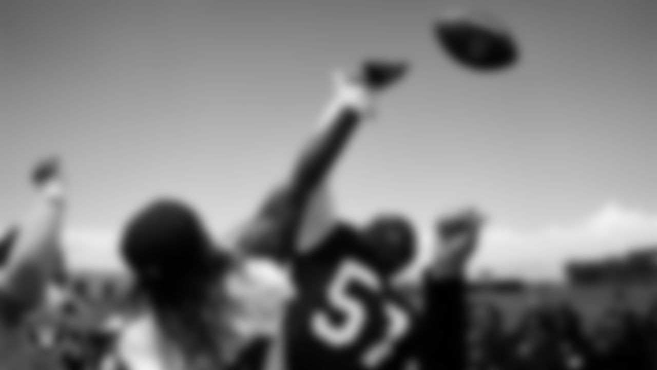 Las Vegas Raiders running back Ashton Jeanty (2) and linebacker Jailin Walker (57) at an Organized Team Activity (OTA) at Intermountain Health Performance Center.