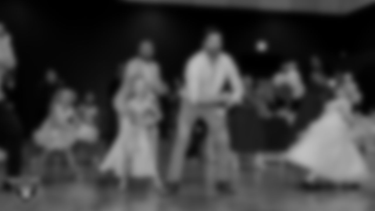 Attendees learn a dance during the Valentine's Day Dance at The Studio.