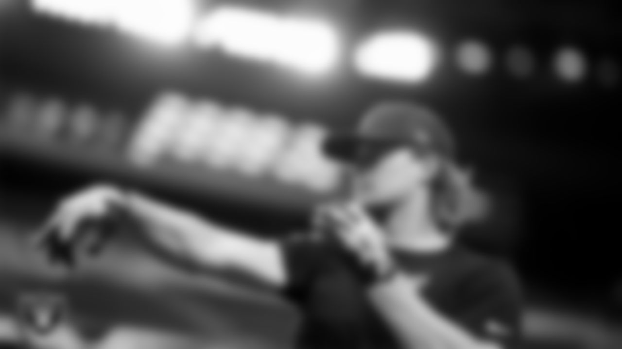 Las Vegas Raiders quarterback Kenny Pickett (15) warming up before the regular season home game against the New York Giants at Allegiant Stadium.