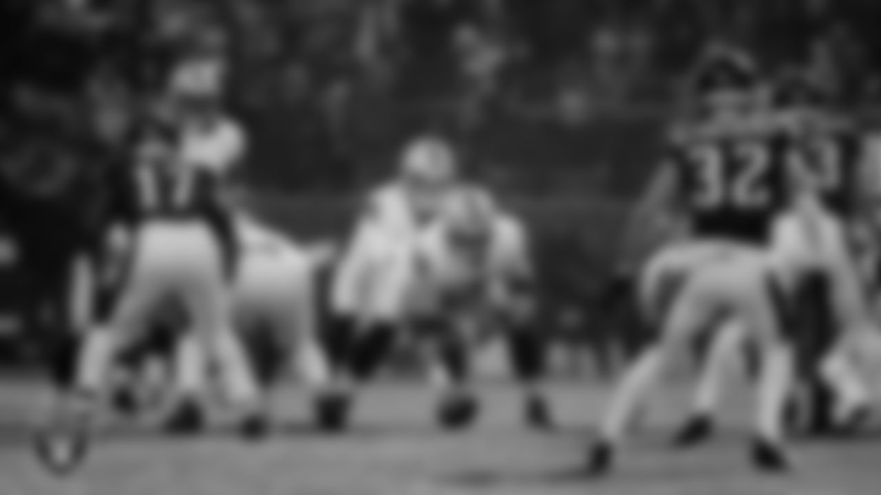 Las Vegas Raiders quarterback Kenny Pickett (15) and guard Alex Cappa (65) line up before the snap during the regular season away game against the Philadelphia Eagles at Lincoln Financial Field.