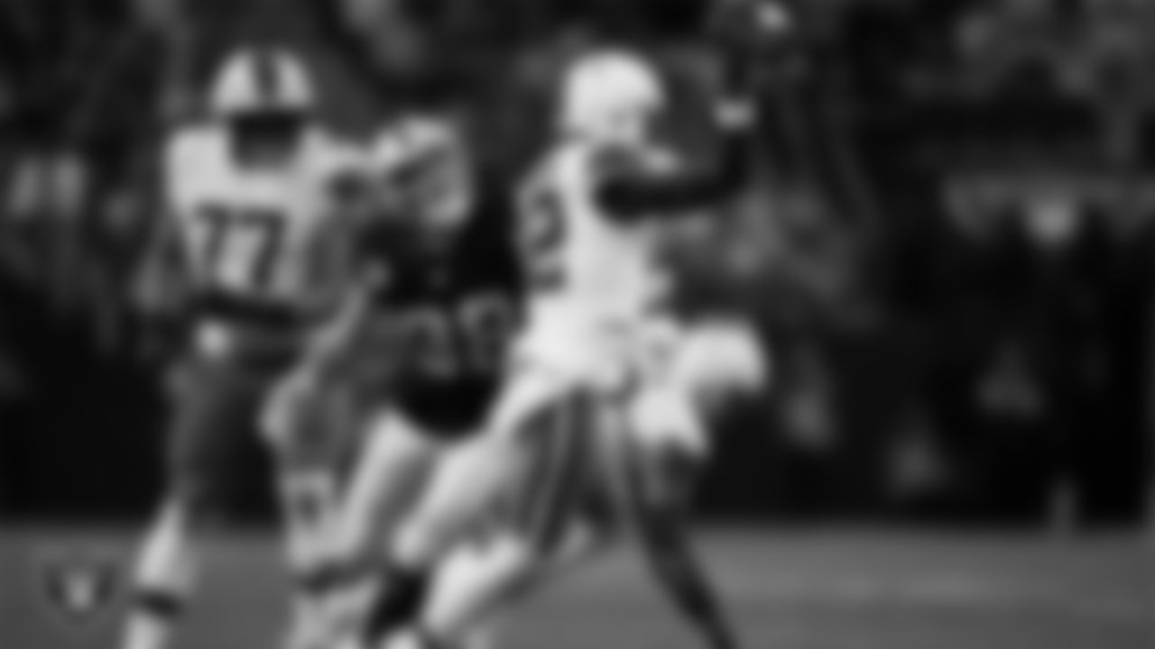 Las Vegas Raiders defensive end Maxx Crosby (98) pressures the quarterback during the regular season home game against the Cleveland Browns at Allegiant Stadium.