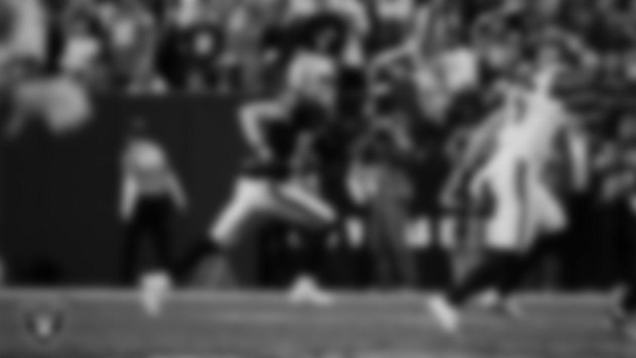 Las Vegas Raiders quarterback Kenny Pickett (15) runs during the regular season home game against the Denver Broncos at Allegiant Stadium.