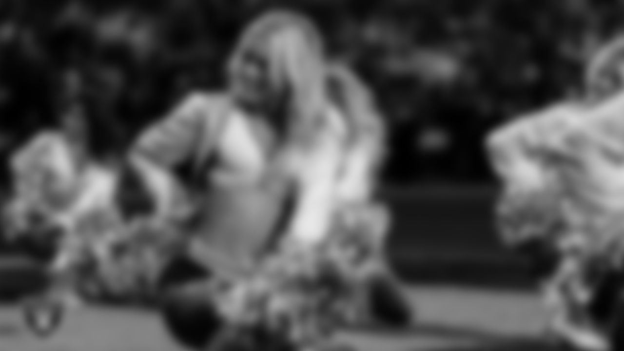Raiderette Kennedy performs on the field during the regular season home game against the Denver Broncos at Allegiant Stadium.