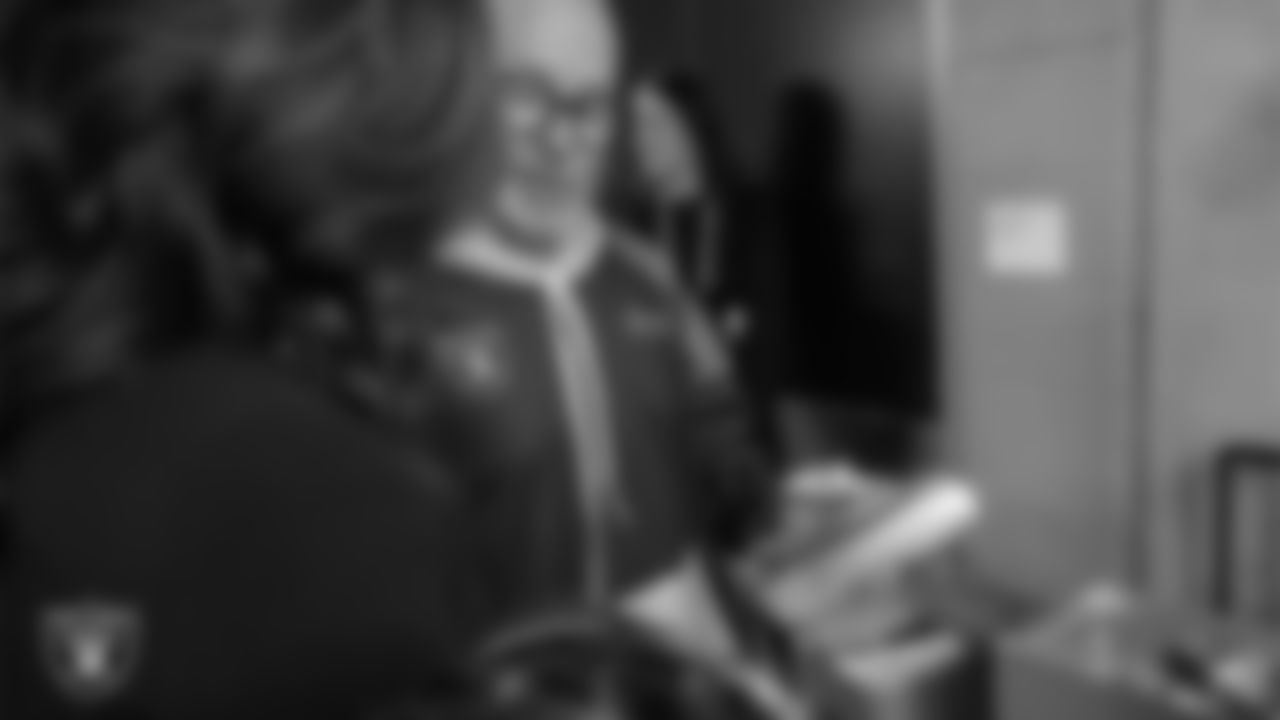 Intermountain Health Regional President Mitch Cloward unboxes his custom shoes for the NFL's My Cause My Cleats initiative before the Las Vegas Raiders' regular season home game against the Cleveland Browns at Allegiant Stadium.