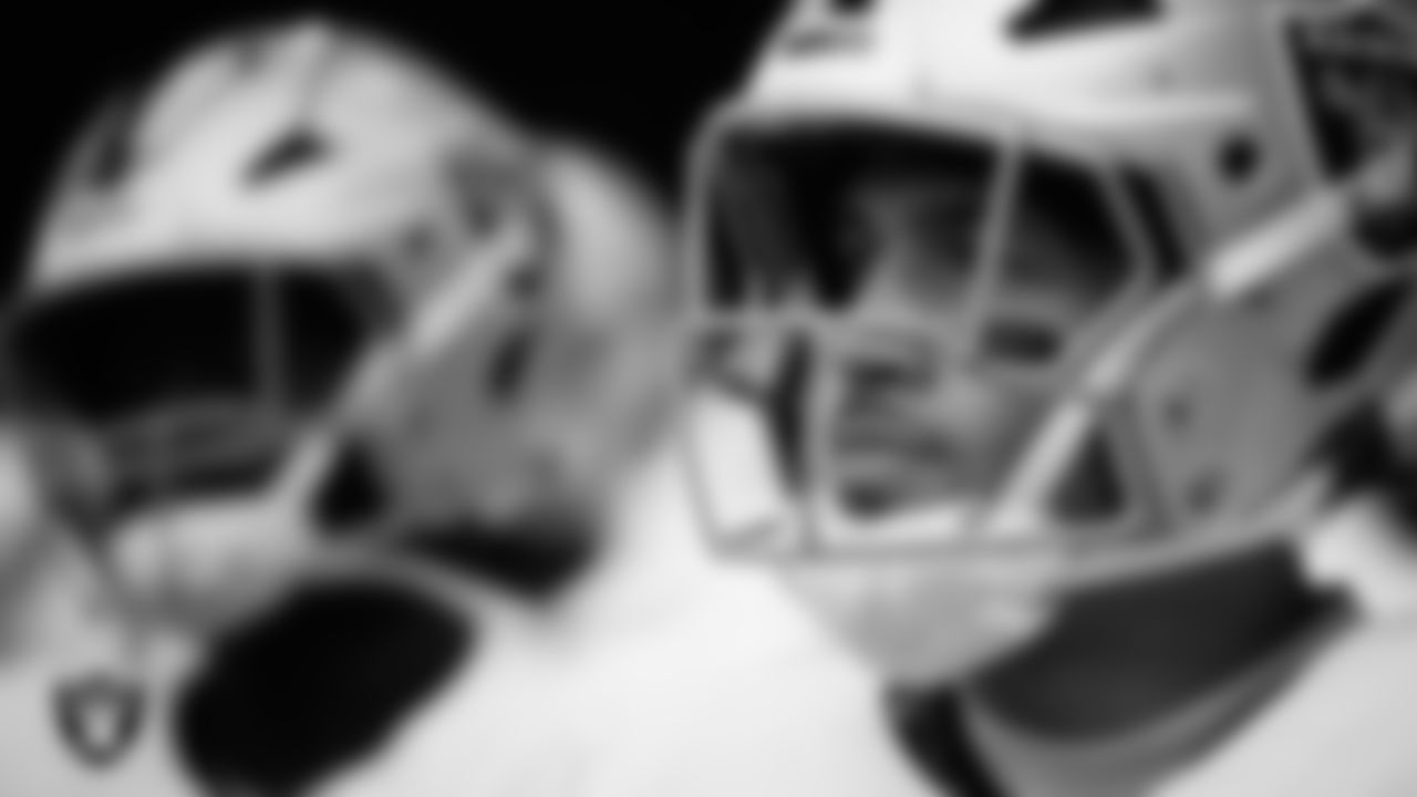 Las Vegas Raiders safety Isaiah Pola-Mao (20) waits for the team to be introduced onto the field before the preseason away game against the Seattle Seahawks at Lumen Field.