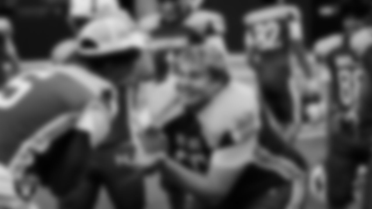 The Needles High School football team celebrates after defeating Pershing County High School in the NIAA 2A Division State Championship game at Allegiant Stadium.