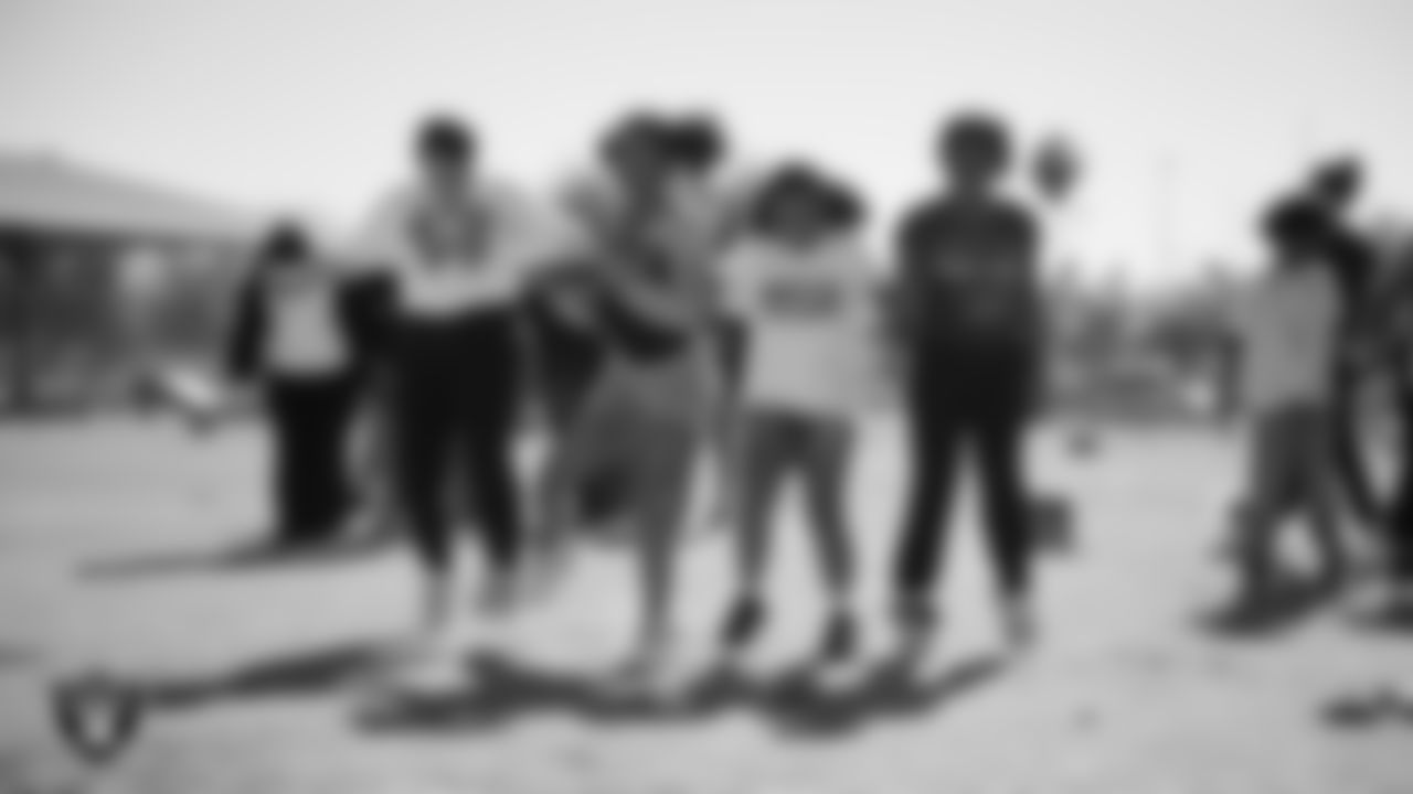 Students participate in activities while learning about flag football, healthy eating and mental health during the R.U.S.H. program at J.D. Smith Middle School.