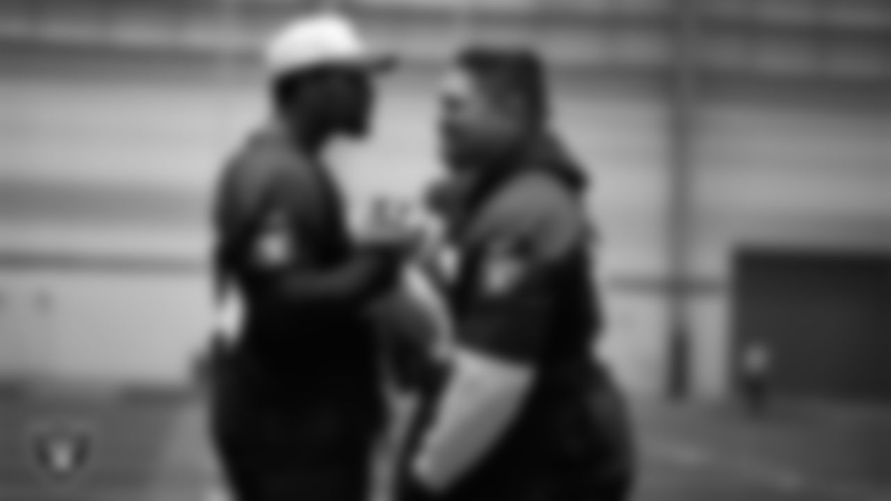 Las Vegas Raiders tackle Charles Grant (60) and guard Atonio Mafi (56) during practice at Intermountain Health Performance Center.