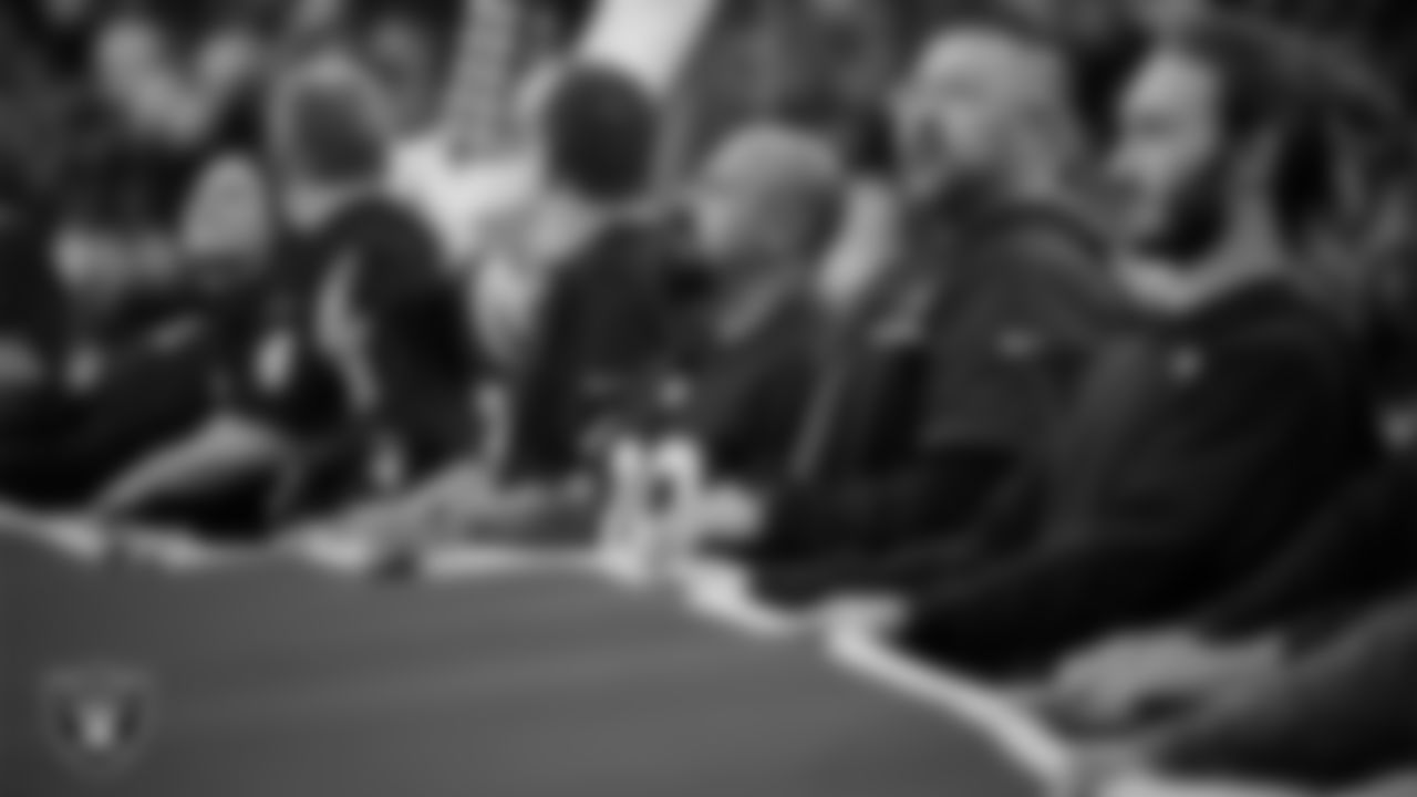 The American flag is displayed by Personal Seat License (PSL) holders on the field during the national anthem before the Las Vegas Raiders' regular season home game against the Cleveland Browns at Allegiant Stadium.