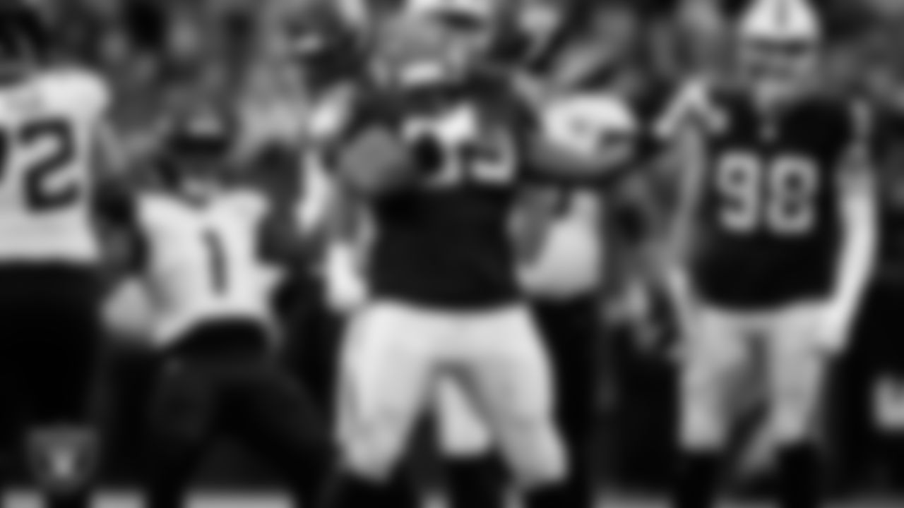 Las Vegas Raiders defensive tackle Adam Butler (69) celebrates after making a tackle during the regular season home game against the Jacksonville Jaguars at Allegiant Stadium.