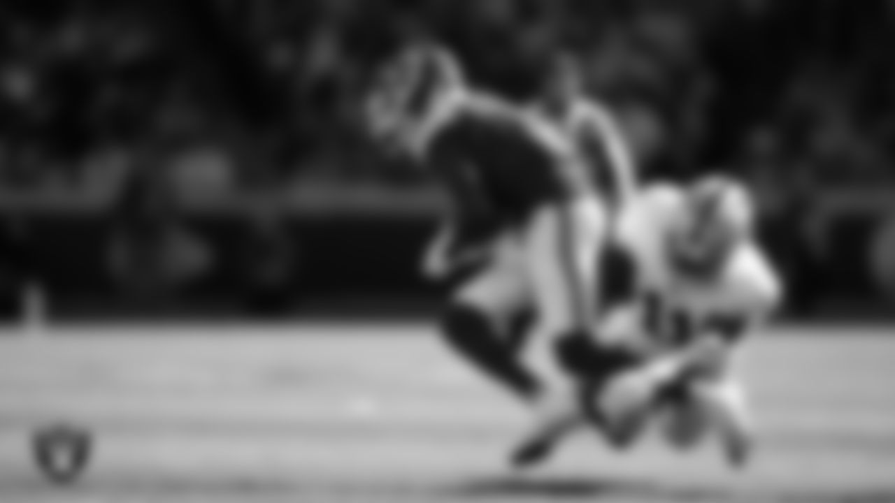 Las Vegas Raiders safety Jeremy Chinn (11) makes a tackle during the regular season away game against the Kansas City Chiefs at GEHA Field at Arrowhead Stadium.