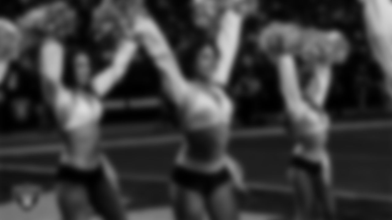 Raiderette Annalise walks onto the field for a performance during the regular season home game against the Kansas City Chiefs at Allegiant Stadium.