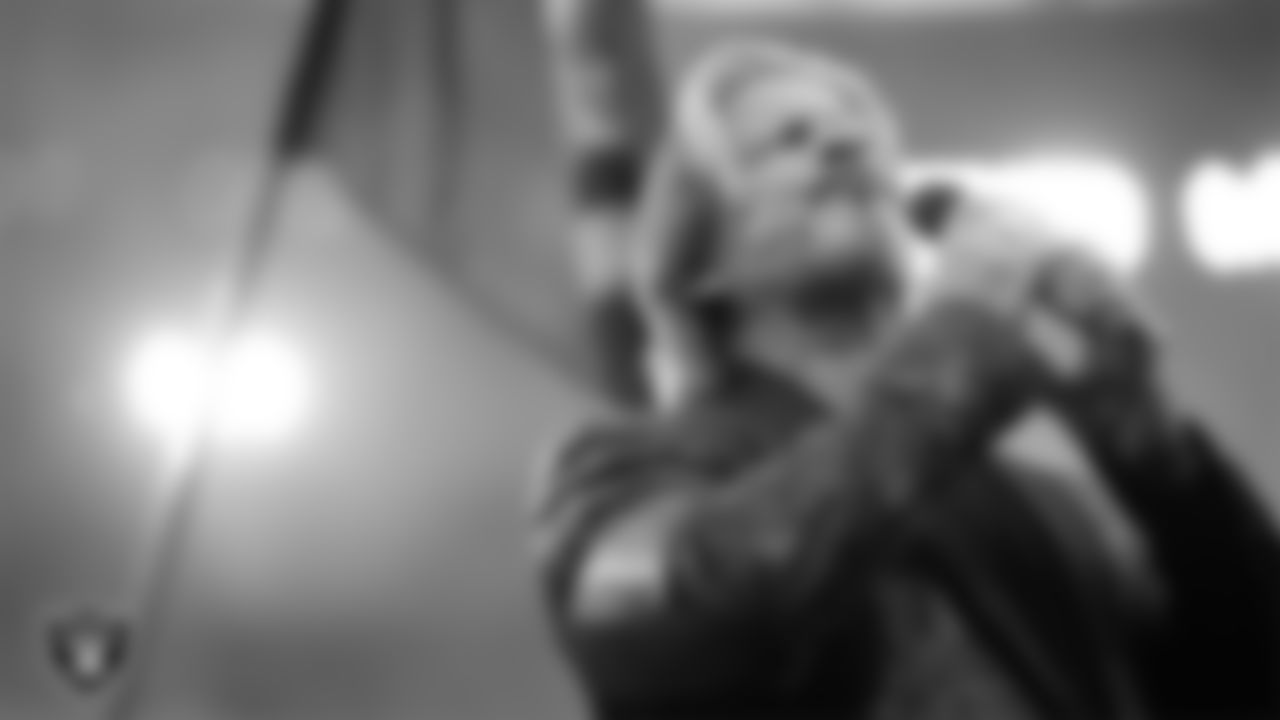 Singer Bucky Heard performs the national anthem before the Las Vegas Raiders' preseason home game against the San Francisco 49ers at Allegiant Stadium.
