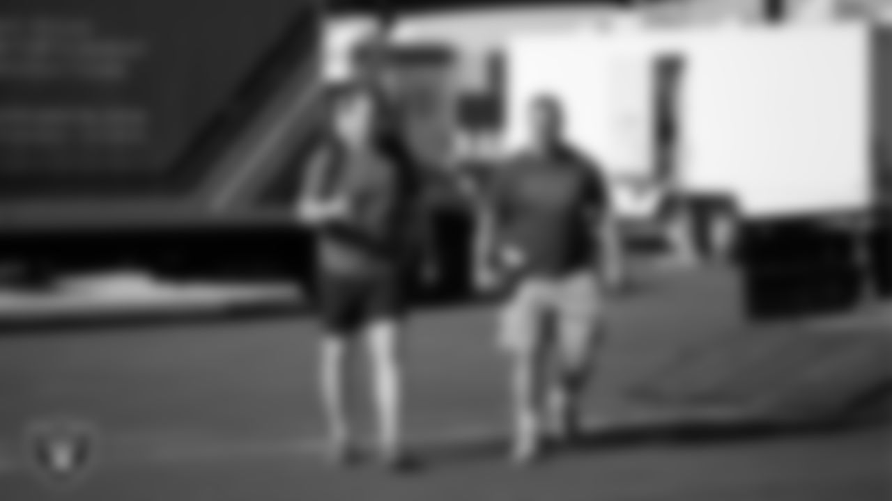 Las Vegas Raiders guard Alex Cappa (65) and offensive lineman Jordan Meredith (61) arrive for 2025 Training Camp at Intermountain Health Performance Center.