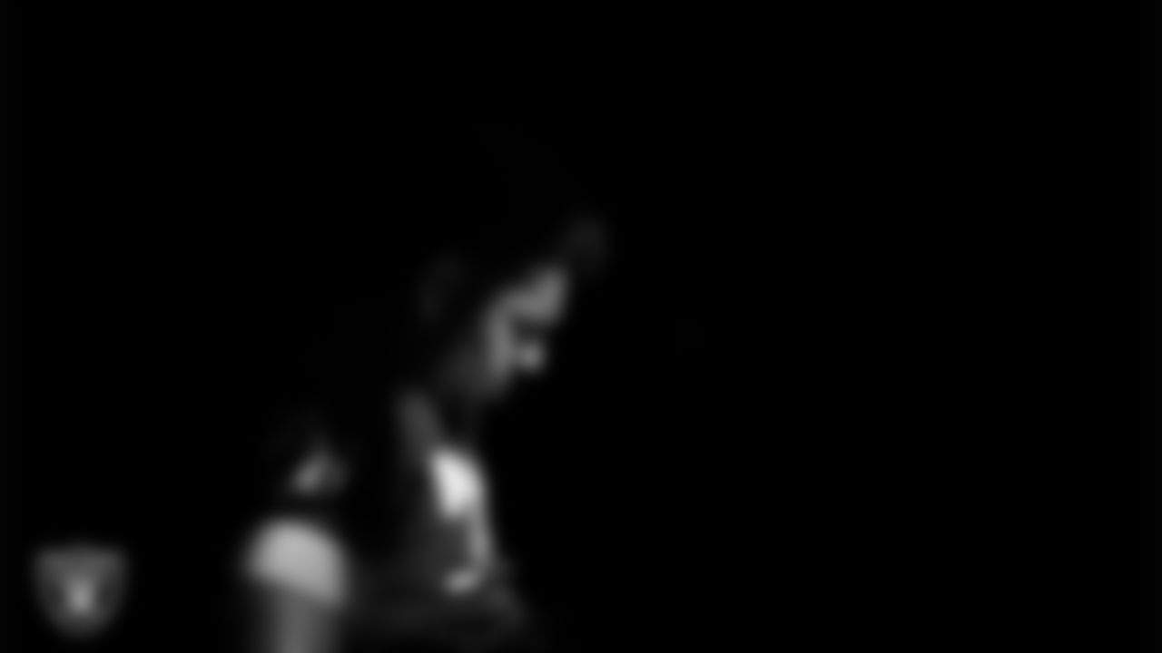 Las Vegas Raiders guard Caleb Rogers (76) walks out to the field for practice at Intermountain Health Performance Center.