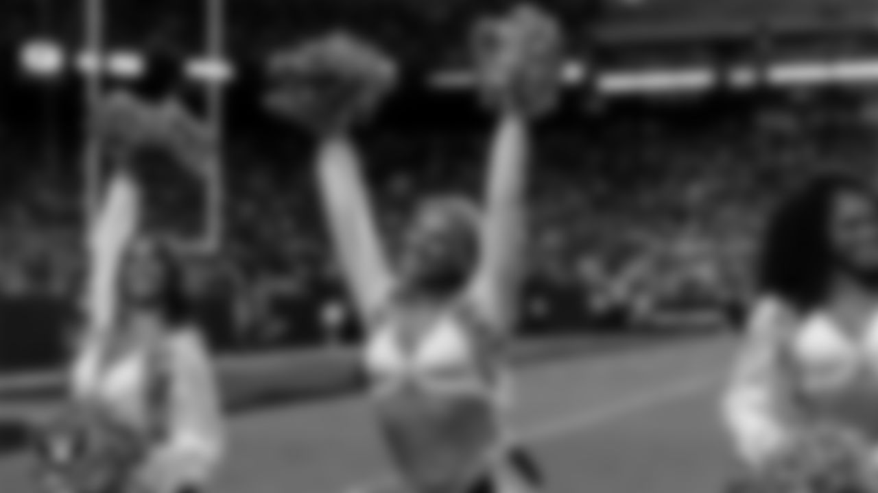 Raiderette Cori on the sidelines during the regular season home game against the Dallas Cowboys at Allegiant Stadium.