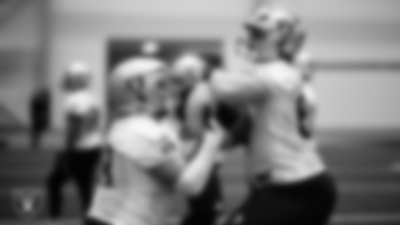 Las Vegas Raiders guard/center Jackson Powers-Johnson (58) and guard Alex Cappa (65) during practice at Intermountain Health Performance Center.