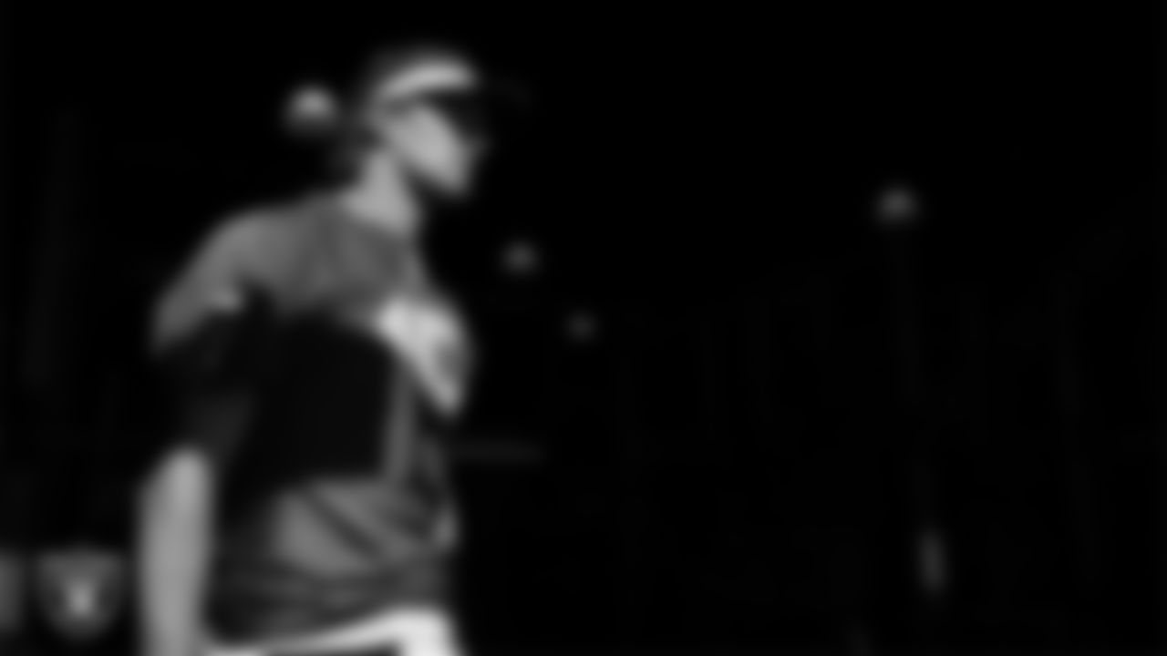 Las Vegas Raiders quarterback Kenny Pickett (15) walks out to the field for practice at Intermountain Health Performance Center.