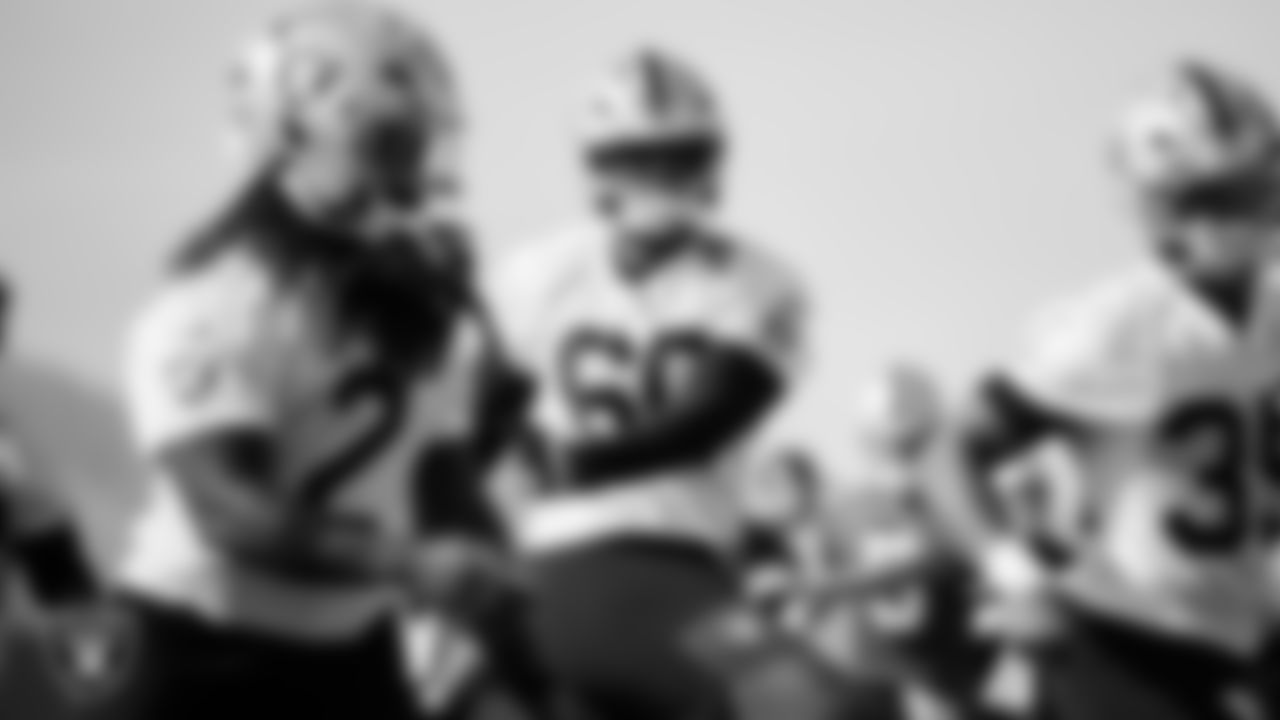 Las Vegas Raiders tackle Charles Grant (60) during practice at Intermountain Health Performance Center.