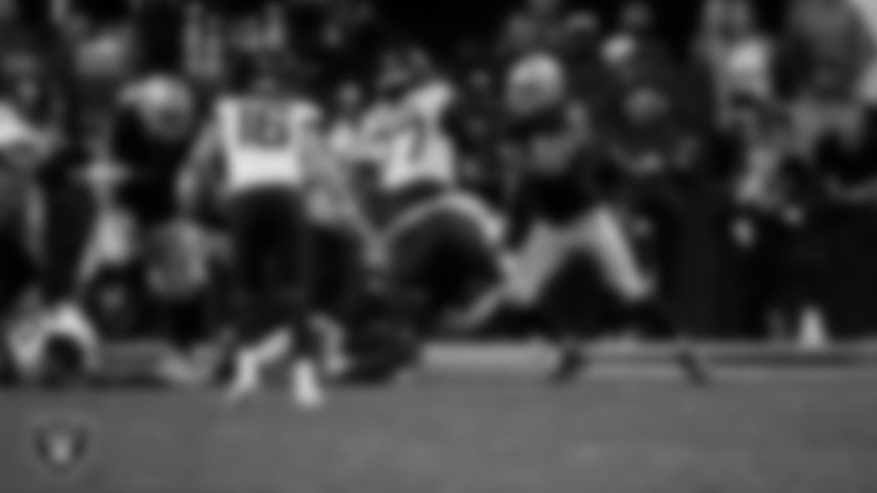 Las Vegas Raiders defensive end Maxx Crosby (98) makes a tackle during the regular season home game against the Jacksonville Jaguars at Allegiant Stadium.