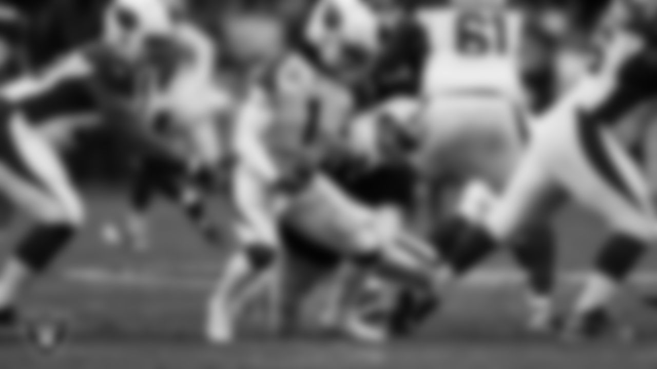 Las Vegas Raiders defensive end Maxx Crosby (98) sacks the quarterback during the regular season home game against the Arizona Cardinals at Allegiant Stadium, Sunday, September 18, 2022, in Las Vegas, Nev.