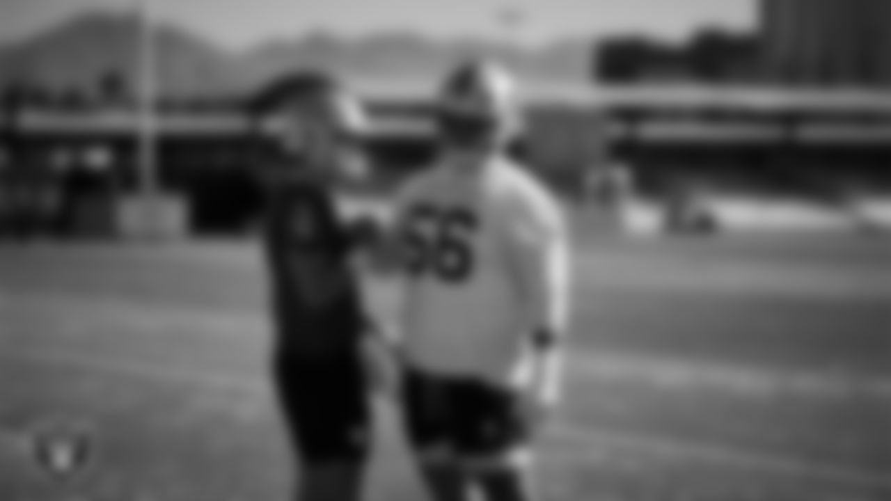 Las Vegas Raiders quarterback Cam Miller (5) and guard Atonio Mafi (56) during practice at Intermountain Health Performance Center.