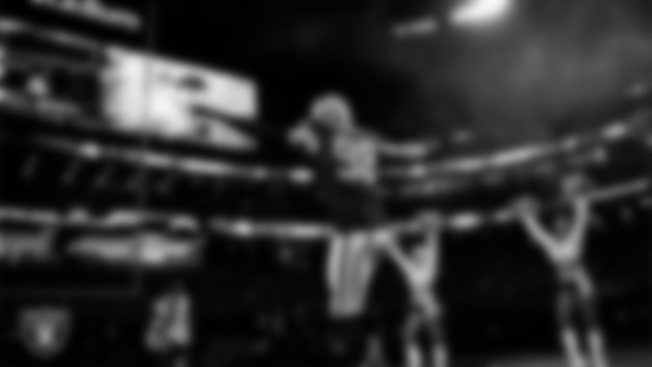 Las Vegas Raiders defensive end Maxx Crosby (98) is introduced onto the field before the regular season home game against the Los Angeles Chargers at Allegiant Stadium.