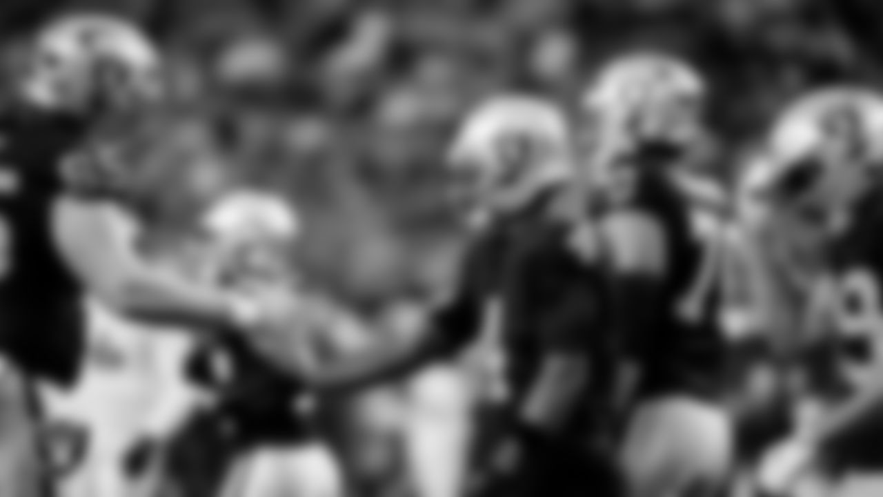 Las Vegas Raiders wide receiver Shedrick Jackson (4) celebrates with guard Alex Cappa (65) after making a 25-yard touchdown catch during the regular season home game against the Denver Broncos at Allegiant Stadium.