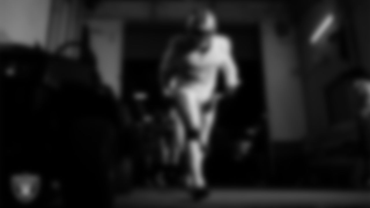 Las Vegas Raiders defensive tackle Tonka Hemingway (97) walks down the tunnel before the regular season away game against the Denver Broncos at Empower Field at Mile High.