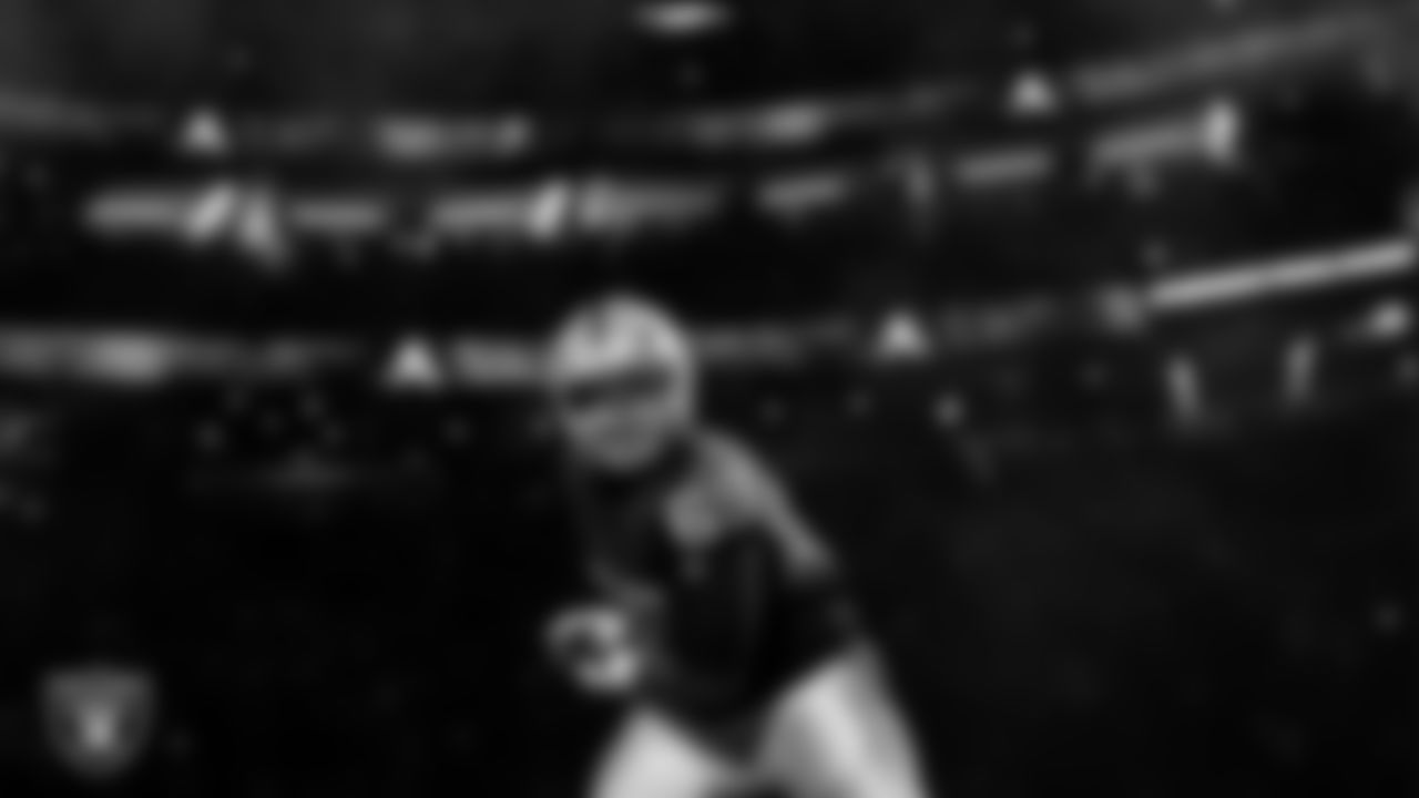 Las Vegas Raiders defensive tackle Adam Butler (69) is introduced onto the field before the regular season home game against the Los Angeles Chargers at Allegiant Stadium,